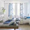 black-grey striped curtain with sofa and armchair