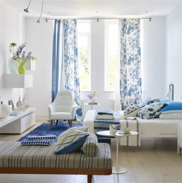 black-grey striped curtain with sofa and armchair