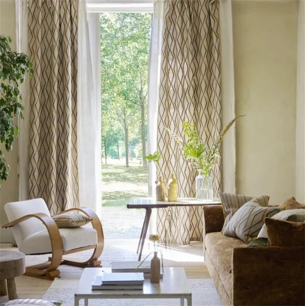 yellow geometric curtain with armchair and sofa