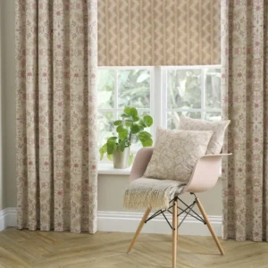 blue botanical curtain with cushion and chair