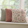 green botanical cushion with cushion and window