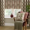 brown striped cushion with armchair and vases