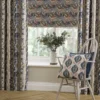 blue striped curtain with cushion and blind
