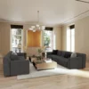 black-grey striped sofa with coffee table and window