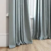 blue plain curtain with window