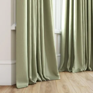 green plain curtain with window