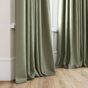 green plain curtain with window