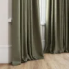 green plain curtain with window