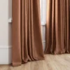 red plain curtain with window