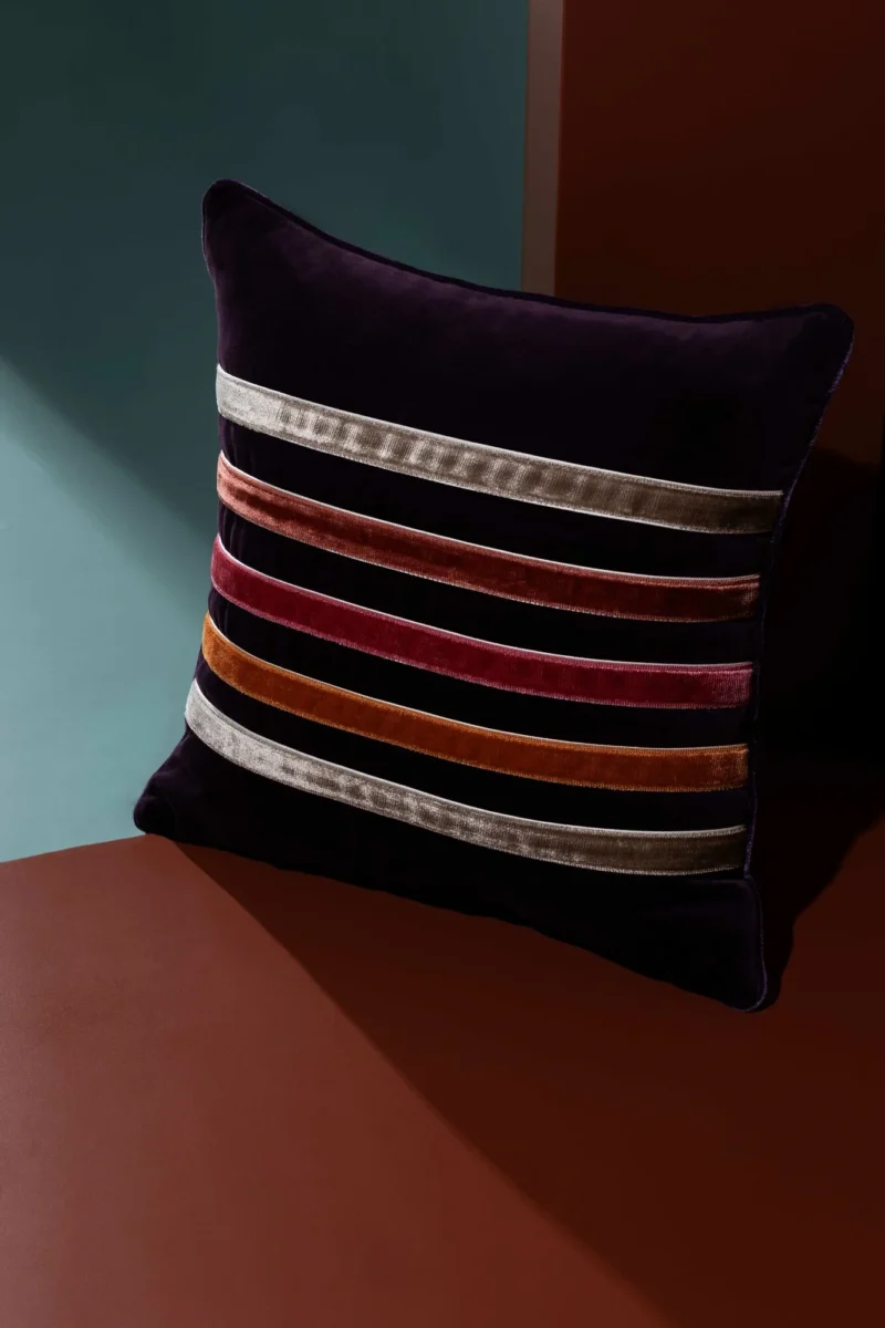 Sloane 1" Velvet Border by dark purple cushion with velvet border stripes across centre