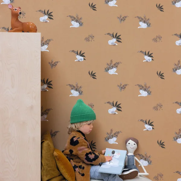 Contempler Wallpaper - Camel by brown botanical wallpaper and wall with cushion and toys