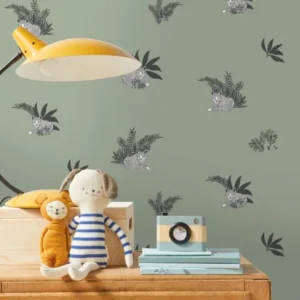 green botanical wallpaper and wall with cabinets and toys