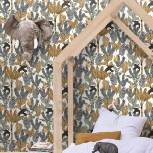 yellow botanical wallpaper and wall with cushion and toys