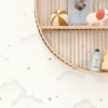 white children's wallpaper and wall with shelf and toys