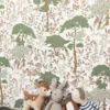 green botanical wallpaper and wall with toys