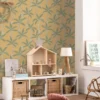yellow botanical wallpaper and wall with cushion and lamps