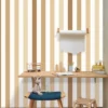 brown striped wallpaper and wall with side table and toys