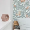 green children's wallpaper and wall with bed and cushion