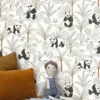 black-grey children's wallpaper and wall with side table and toys