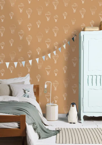 Voyager Wallpaper - Camel by white children's wallpaper and wall with bed and toys