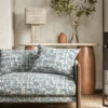 blue animal sofa with side table and lamps