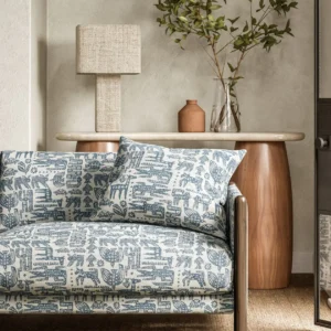 blue animal sofa with side table and lamps
