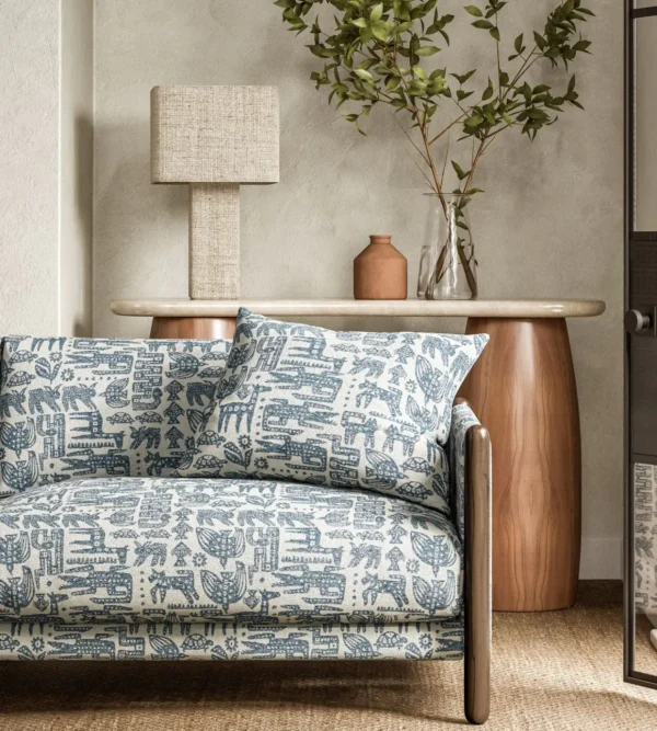 blue animal sofa with side table and lamps