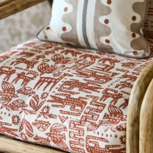 red animal armchair with cushion
