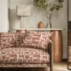 red animal sofa with side table and lamps