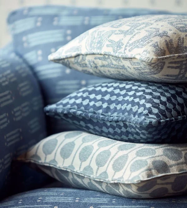 Taimi Fabric - Mist by blue spotted cushion with sofa