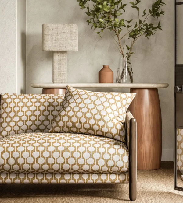 Taimi Fabric - Barley by yellow spotted sofa with side table and lamps