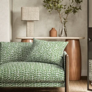 green misc sofa with side table and lamps