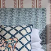 blue misc bed with cushion and wall