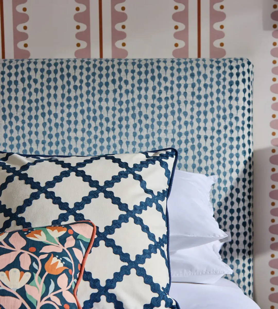 blue misc bed with cushion and wall