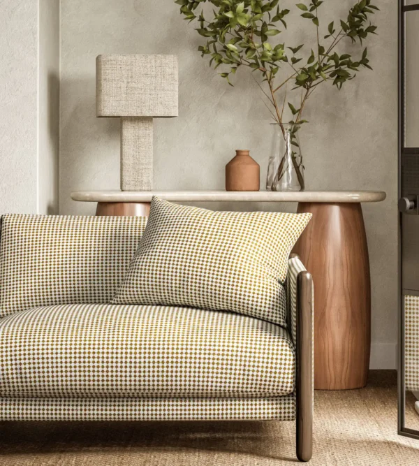Ragdale Fabric - Barley by yellow geometric sofa with side table and lamps