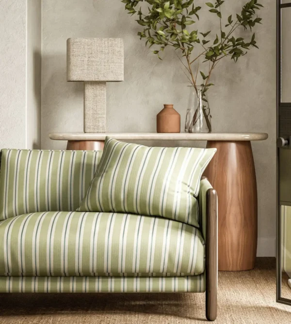 Melton Stripe Fabric - Seaglass by green striped sofa with side table and lamps