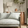 neutral misc sofa with side table and lamps