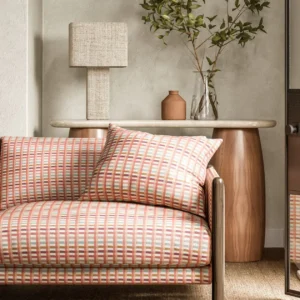 red striped sofa with side table and lamps