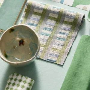 green striped fabric with vases