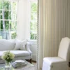 green geometric border on white curtain