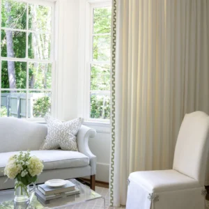 green geometric border on white curtain