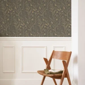 brown botanical wallpaper and chair with