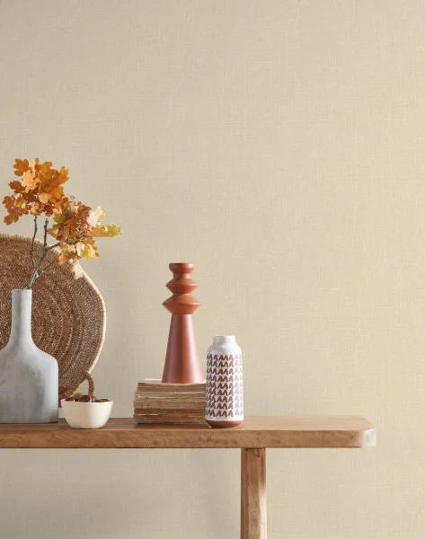 Java Wallpaper - Beige Ficelle by white plain wallpaper and wall with side table and vases