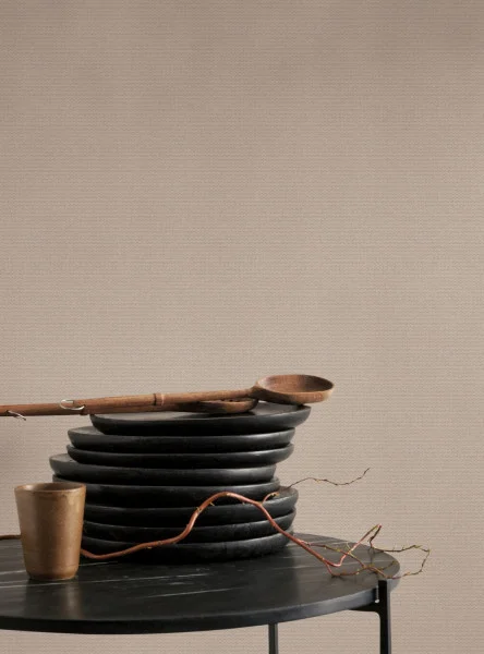 Helsinki Resolution Wallpaper - Uni Noisette by black-grey plain wallpaper and wall with coffee table and vases