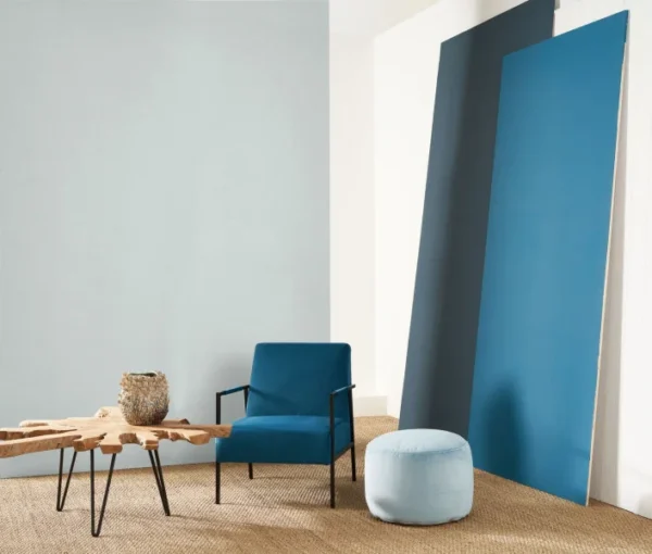 Helsinki Resolution Wallpaper - Bleu by blue plain wallpaper and wall with armchair and pouf