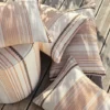 yellow striped pouf with cushion