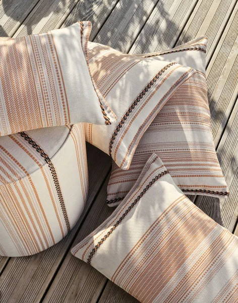 Ravello Fabric - Noir by yellow striped pouf with cushion