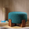 white plain pouf with rug