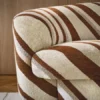 brown striped sofa with cabinets