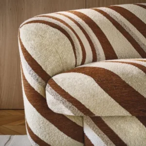 brown striped sofa with cabinets